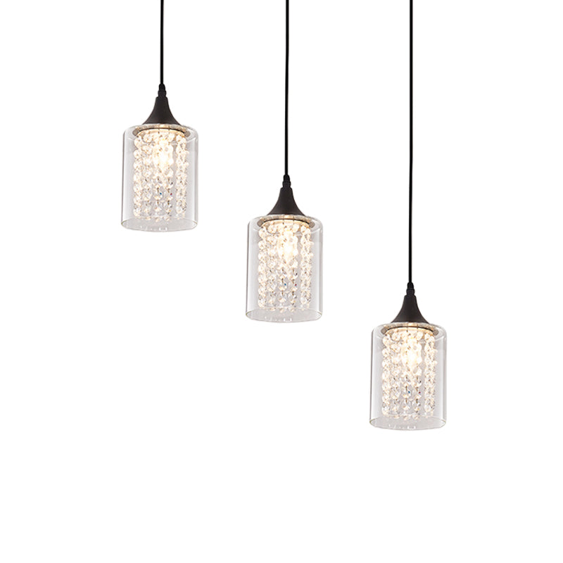 Clear Glass Cylinder Multiple Hanging Light Minimalist 3-Light Black Pendulum Lamp with Linear/Round Canopy Clearhalo 'Ceiling Lights' 'Close To Ceiling Lights' 'Glass shade' 'Glass' 'Modern Pendants' 'Modern' 'Pendant Lights' 'Pendants' Lighting' 982679