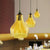 Yellow/Green/Clear Glass Gourd Suspension Pendant Contemporary 1 Light Black Hanging Lamp for Restaurant Yellow Clearhalo 'Ceiling Lights' 'Glass shade' 'Glass' 'Modern Pendants' 'Modern' 'Pendant Lights' 'Pendants' Lighting' 991268