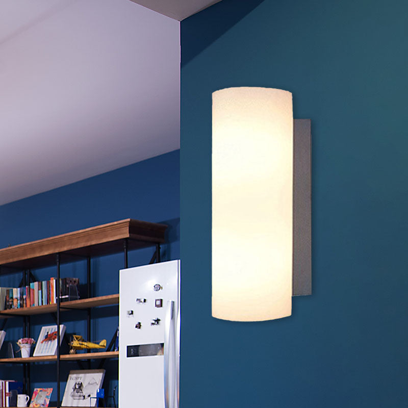 Cylindrical Bedroom Sconce Lighting White Glass 1 Light Modernist Wall Mount Light Clearhalo 'Cast Iron' 'Glass' 'Industrial' 'Modern wall lights' 'Modern' 'Tiffany' 'Traditional wall lights' 'Wall Lamps & Sconces' 'Wall Lights' Lighting' 991277