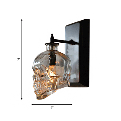 Clear Glass Skull Shaped Wall Sconce Modern 1 Light Living Room Lighting Fixture in Black Clearhalo 'Art deco wall lights' 'Cast Iron' 'Glass' 'Industrial wall lights' 'Industrial' 'Middle century wall lights' 'Modern' 'Rustic wall lights' 'Tiffany' 'Traditional wall lights' 'Wall Lamps & Sconces' 'Wall Lights' Lighting' rrr44